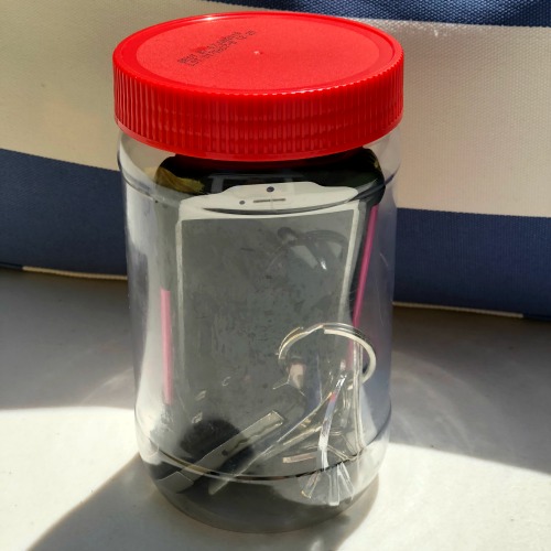 Beach hacks phone in a jar