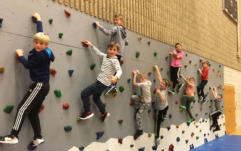 Ada Christian school kids on climbing wall