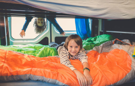 Camping-Hacks-kids-in-camper-laughing