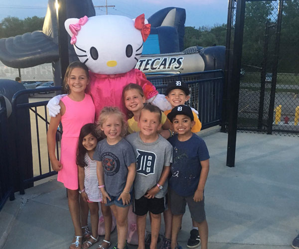 kids with hello kitty at baseball game