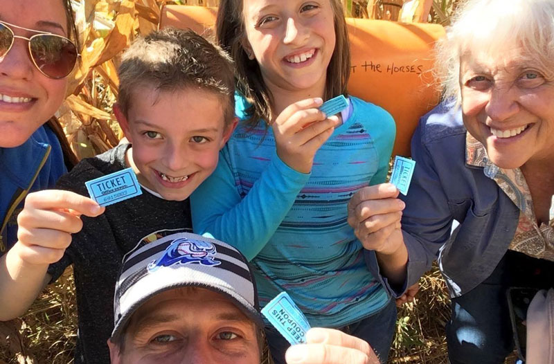 Family having corn maze fun at Olin Farms