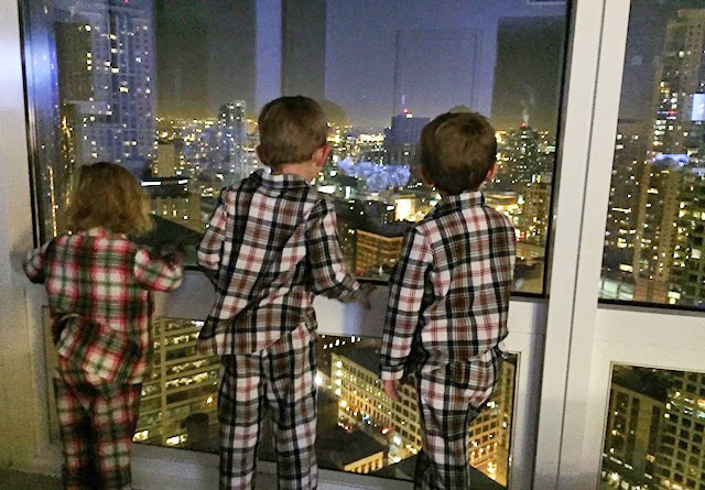 Kids Looking at Skyscrapers during Chicago Christmas
