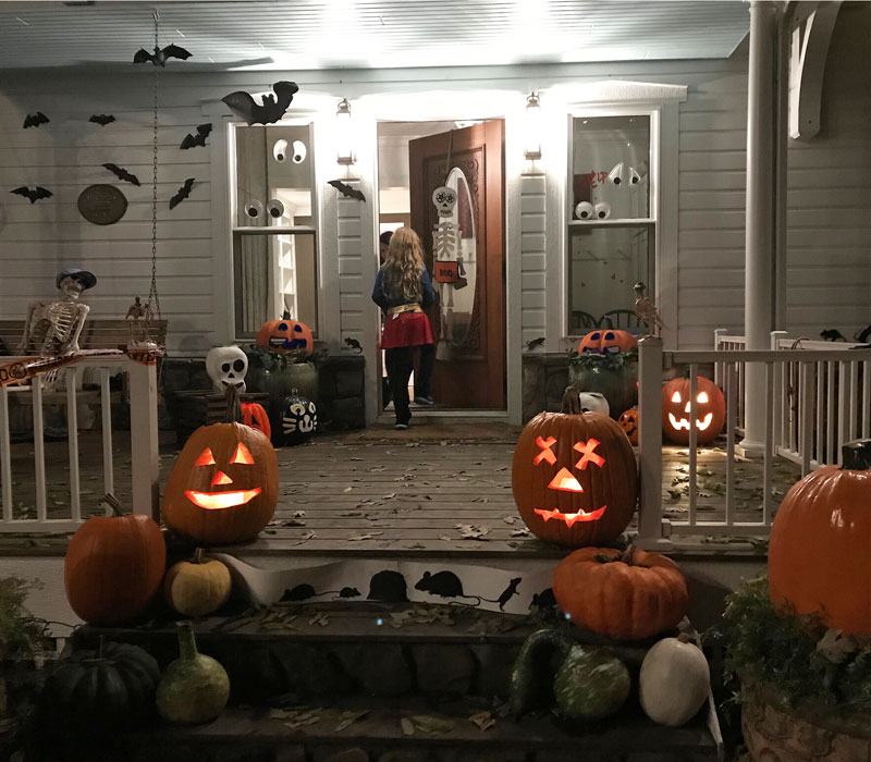 trick-or-treat-times-girl-on-spooky-porch