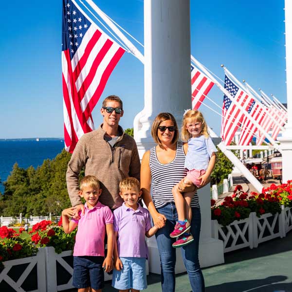 Family on porch of Grand Hotel on Mackinac Island 