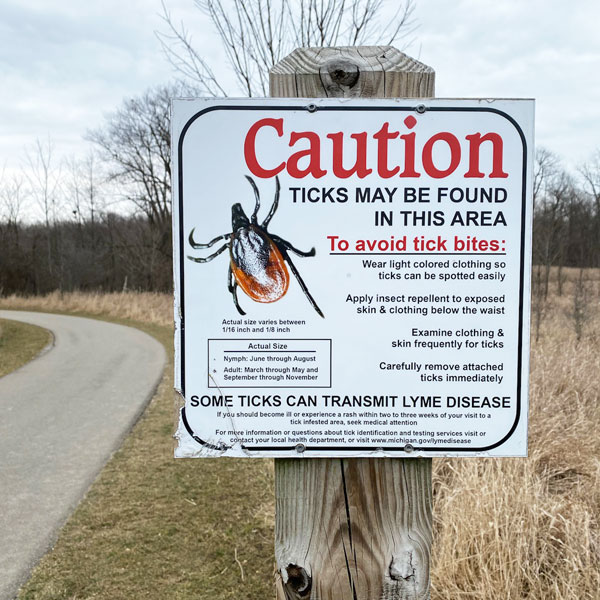 Caution-Tick-Sign-on-Michigan-trail