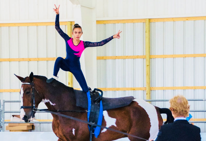 Legacy Stables girl vaulting on horse