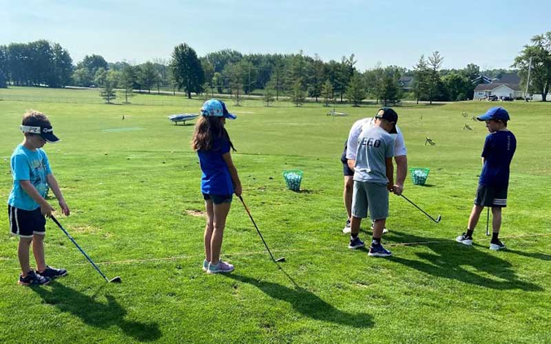 Maple Hill Golf lessons kids on driving range