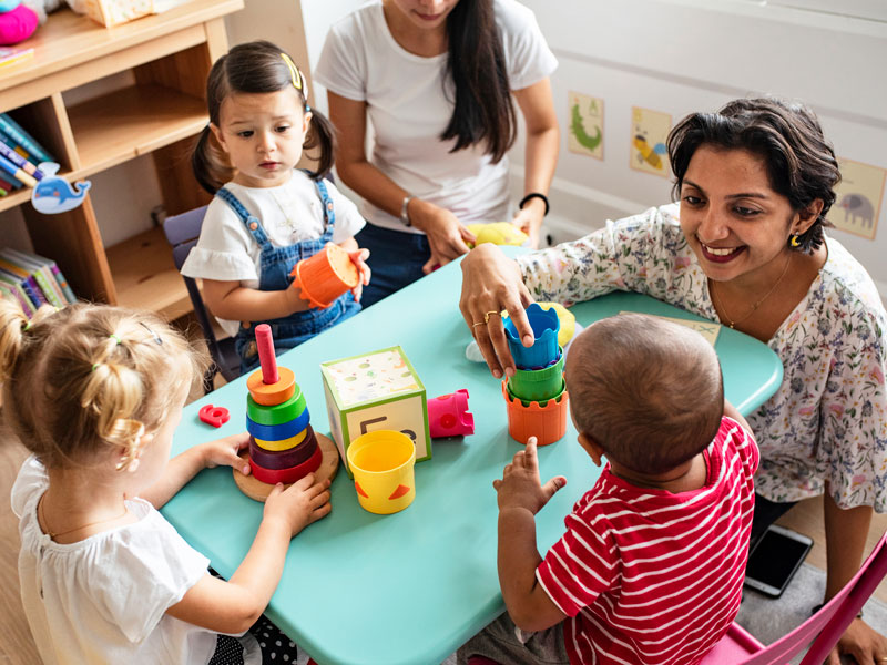 daycare kids child care with teacher