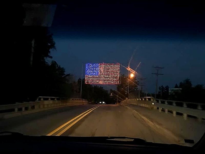 flag over torch bridge 4th of july