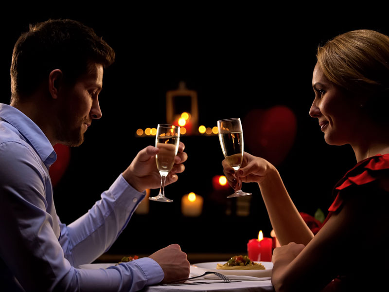 Date-Night-restaurants-couple-having-champagne