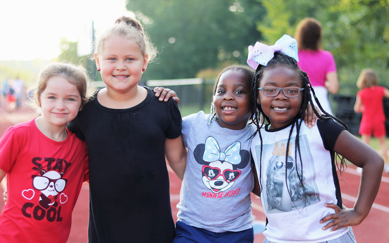 GVSU Charter Public Schools Core Values girls on playground