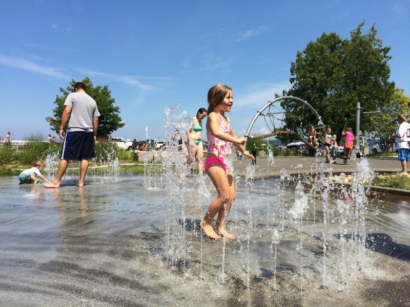 Michigan Summer Vacations include downtown-traverse-city-splash-pad-clinch-park