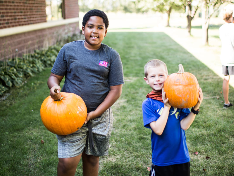 Rockford Christian GRCS students with pumpkins