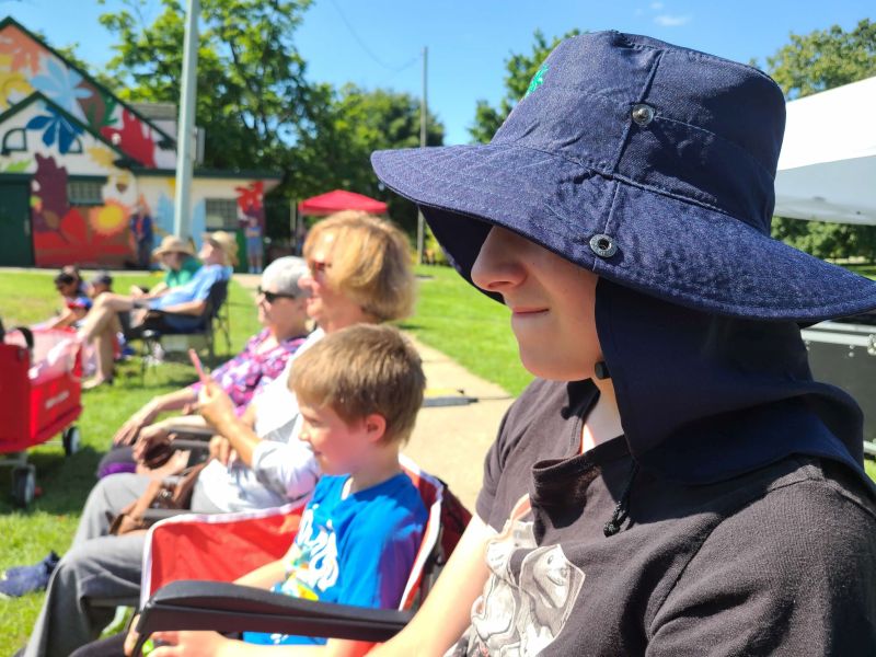 Grandma and grandsons watching a Lollipops concert