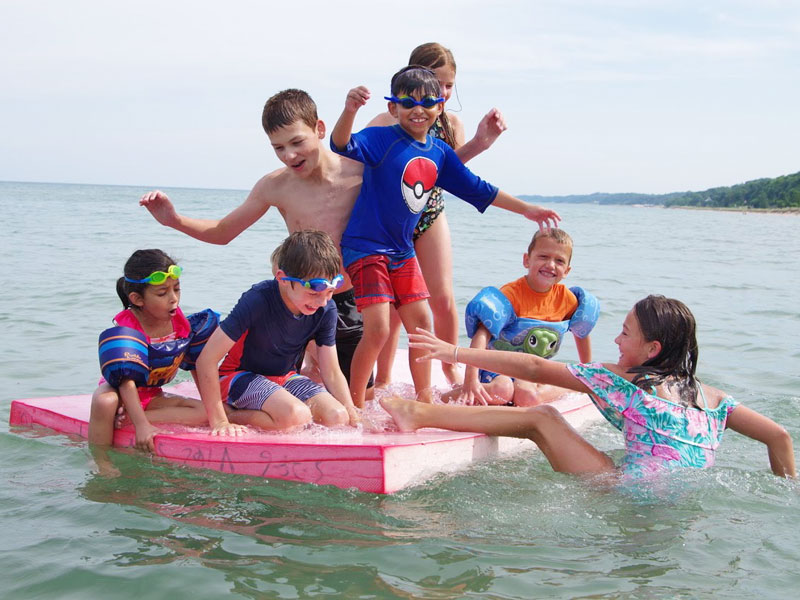 kids on summer raft in lake fun Siemens