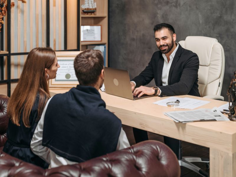 lawyer talking to couple