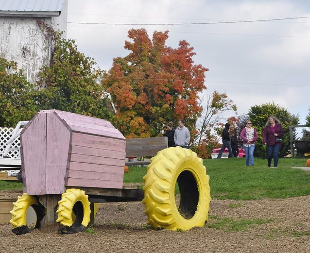 Ed Dunneback and girls play area tractor