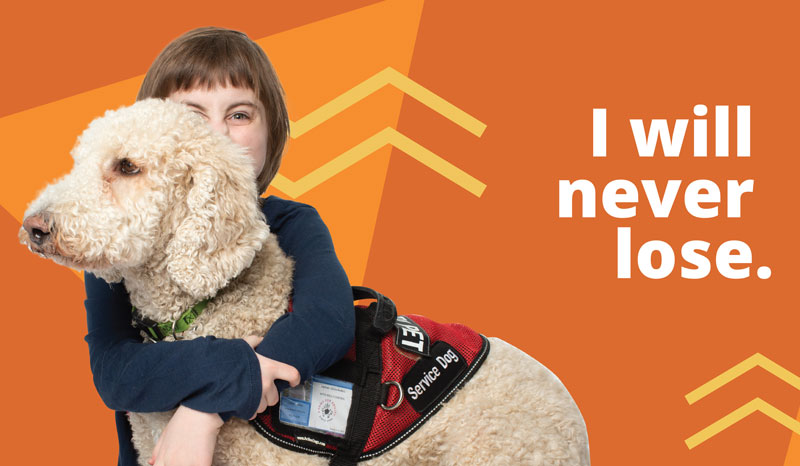 Girl with therapy dog using Miable savings program.
