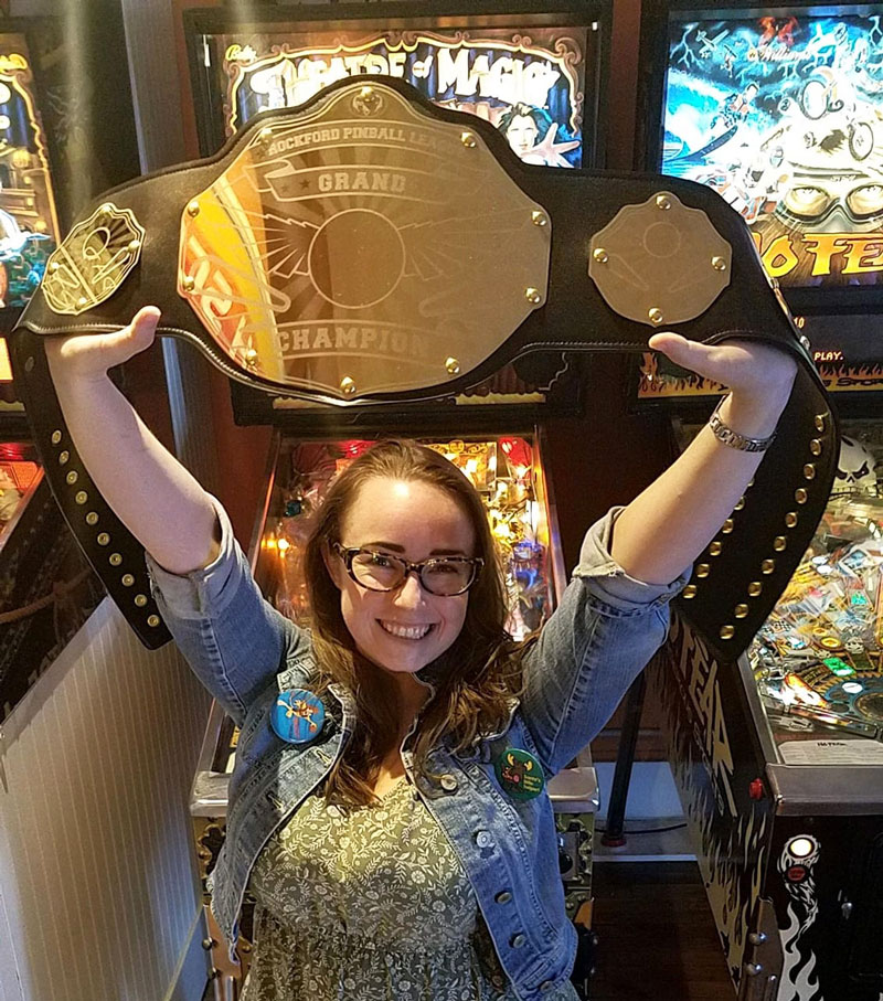 Pinball land championship belt with happy winner