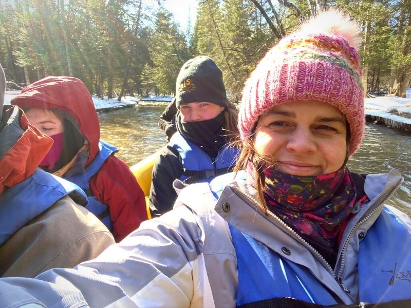 Winter date ideas don't have to be indoors. Winter rafting is really fun. 