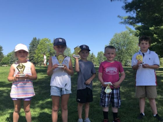 Maple Hill Golf jr golfers with trophies