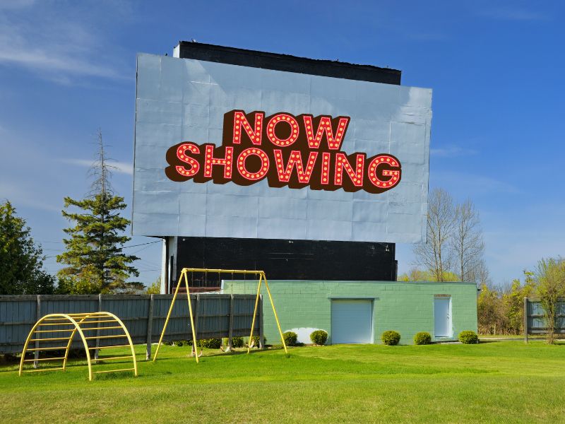 Drive in movie screen building playground Canva