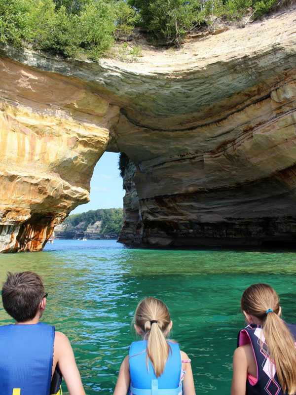 One of Michigan's favorite National Parks is Pictured Rocks National Lakeshore, where you can kayak right up to massive sandstone formations. 