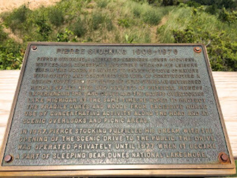 Pierce Stocking, a native of northern Lower Michigan, worked as a lumberman and spent much of his leisure time in the woods. He wanted to share his love of nature with others and conceived the idea of constructing a scenic drive onto the Sleeping Bear Dunes. He envisioned people of all ages and degrees of physical fitness experiencing the sand dunes and the bluffs overlooking Lake Michigan. At the same time, he hoped to protect the fragile dunes and woods from excessive human use by concentrating activity along the road and at scenic overlooks and picnic areas.
In 1967, Pierce Stocking fulfilled his dream with the opening of the scenic drive to the public. The drive was operated privately until 1977 when it became a part of Sleeping Bear Dunes National Lakeshore.