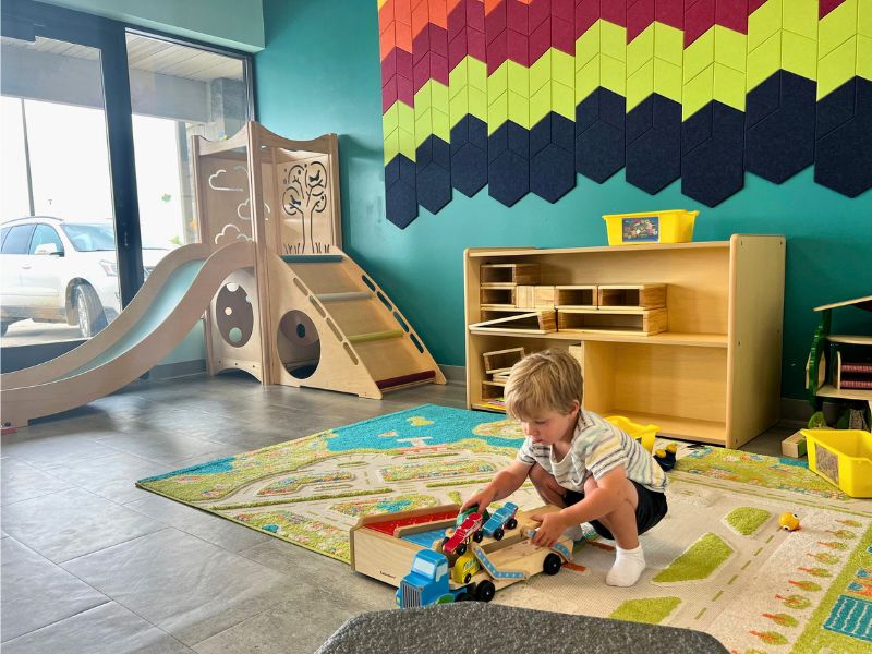 Child playing at Stomping Grounds Play Cafe