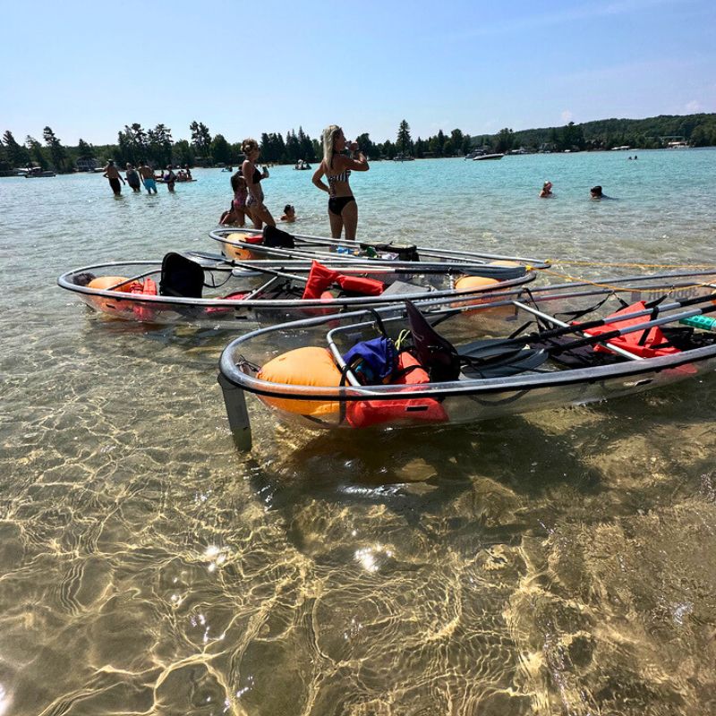 clear kayaks anchored torch lake sandbar