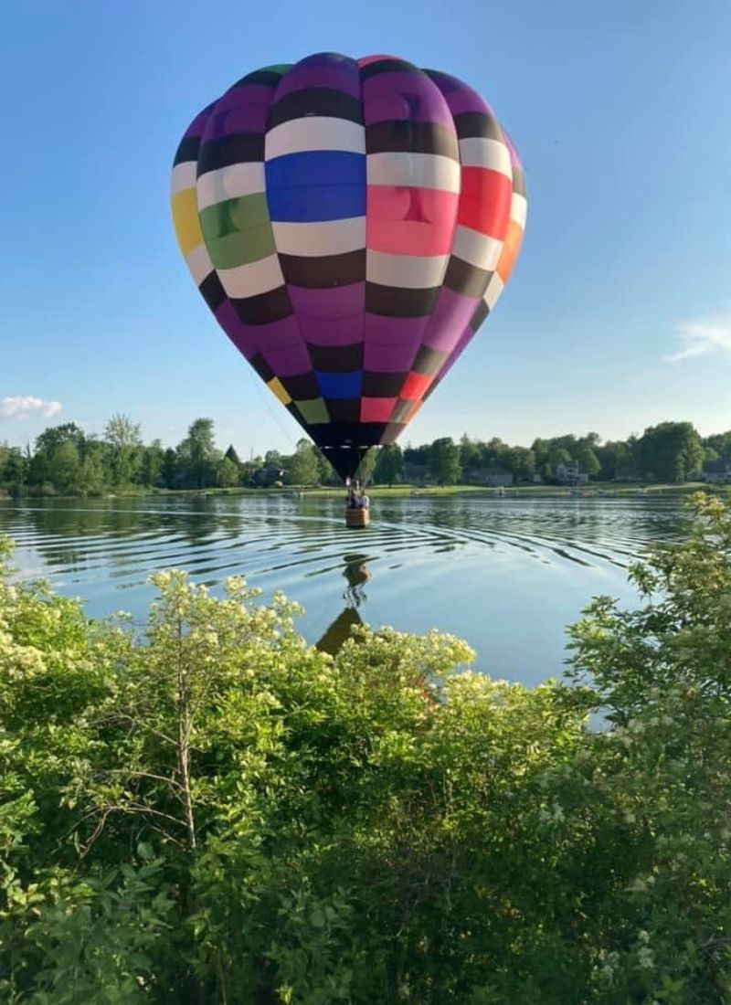 Magic Clouds Hot Air Balloon Rides over lake