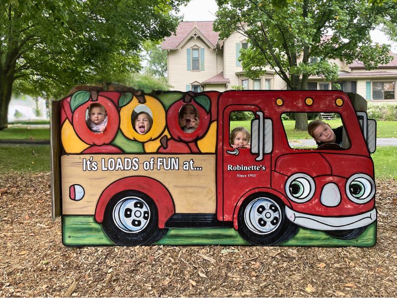 Robinettes kids making faces in truck cut out Augustyn