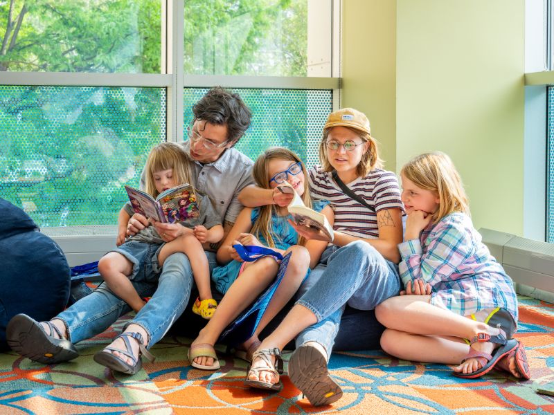 All Ages enjoying books at Grand Rapids Public Library