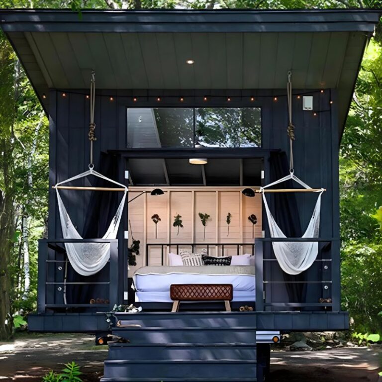 Cabin with hammock chairs at The Woods Luxury Camping in Fennville