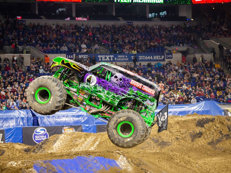 12,000-pound monster truck Grave Digger soars over a jump