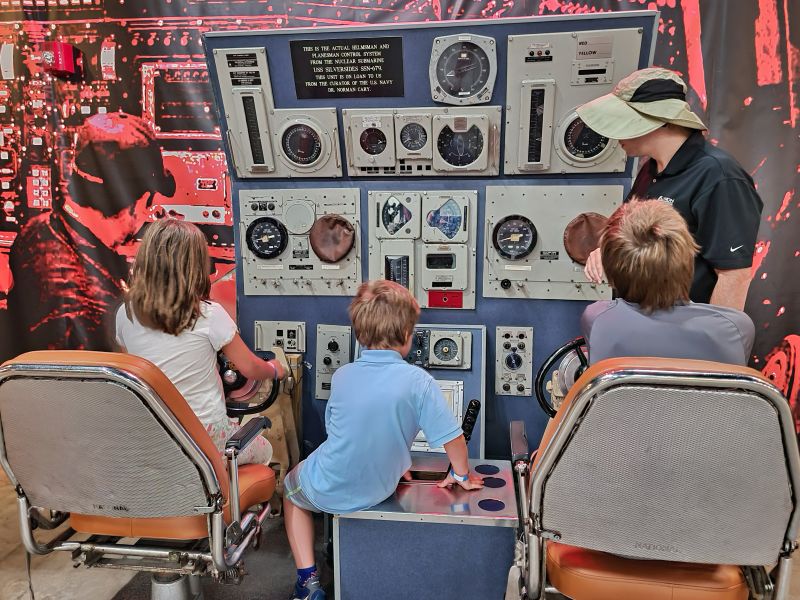 USS-Silversides-Museum-dad-and-kids-at-controls-system