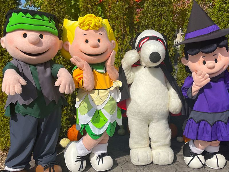 Michigans Adenture tricks and treats peanuts characters in costumes 
