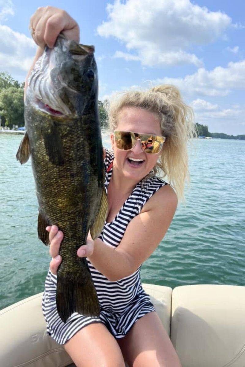 free fishing woman with big fish