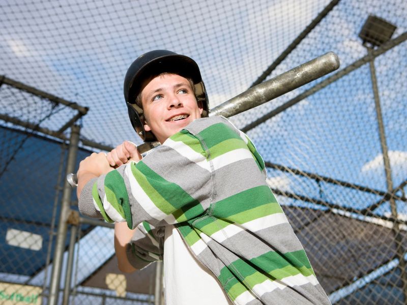 teen boy batting cage