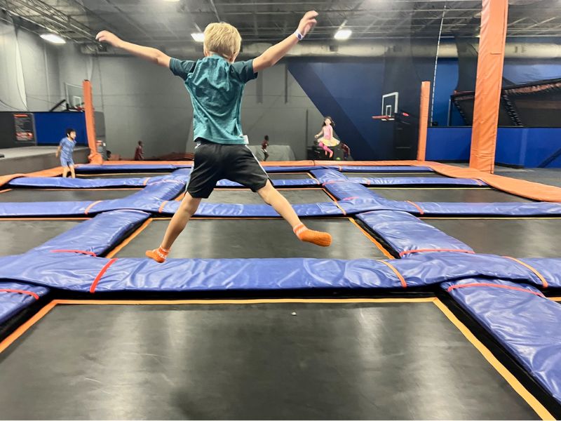 skyzone grand rapids boy jumping on trampoline 