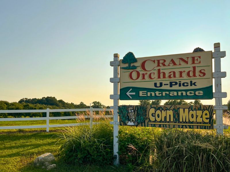 Cranes Orchards fall sign by field facebook