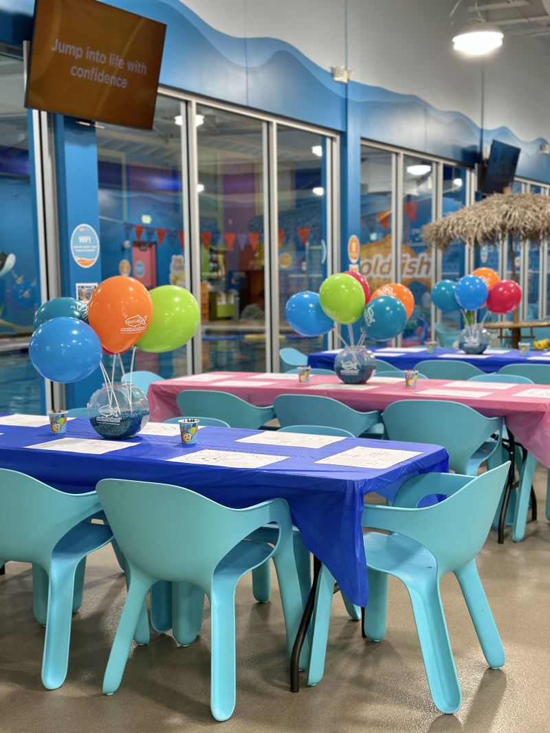 Goldfish Swim School Grandville birthday party room set up with pool in background