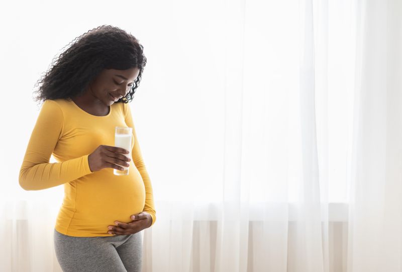 pregnant woman drinking milk