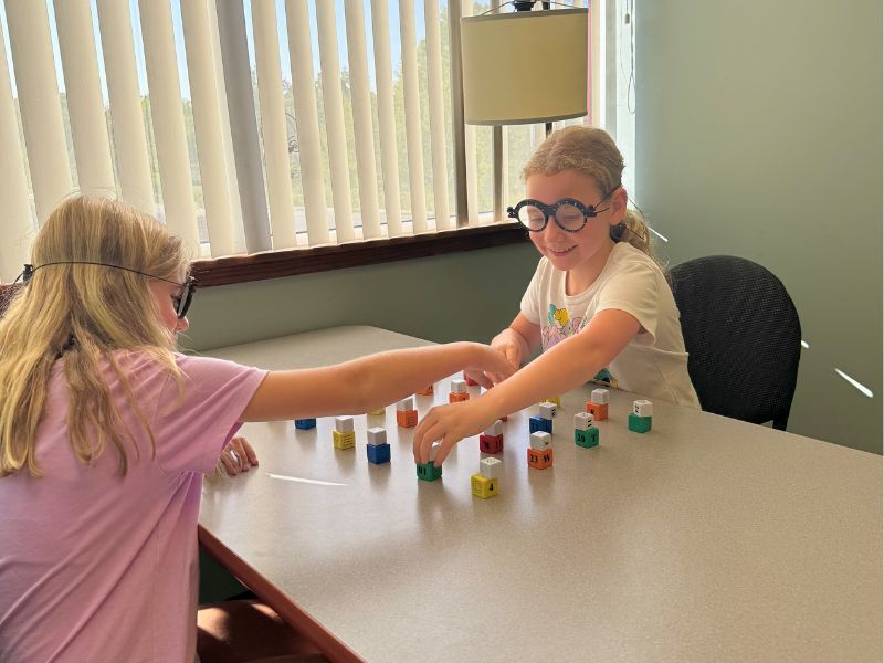 Wow Vision Therapy girl playing game in therapy glasses