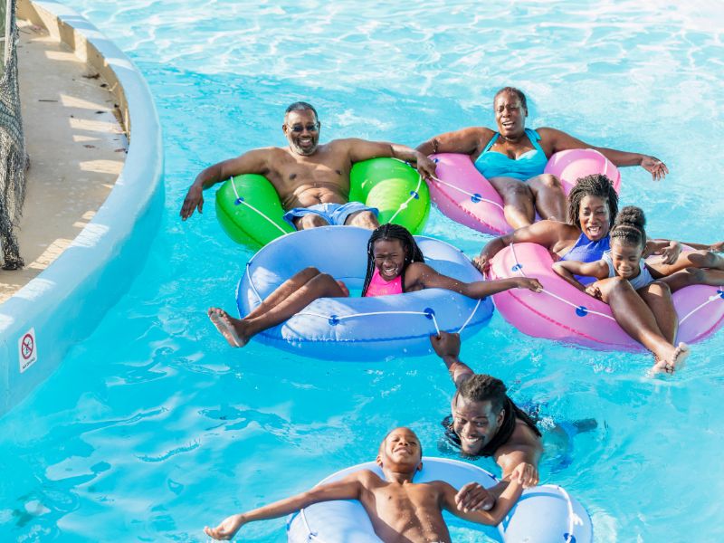 family on lazy river canva kali9 getty images (1)