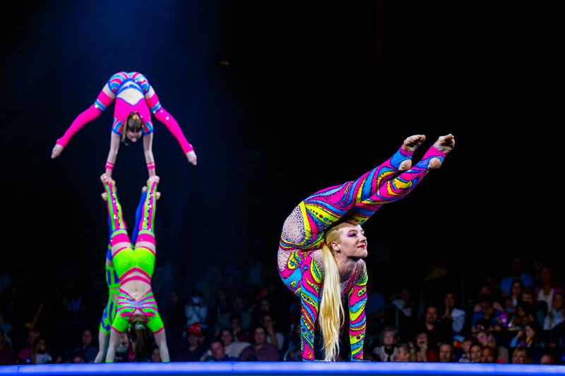 Small Woman Acrobats Legs Of Head Circus