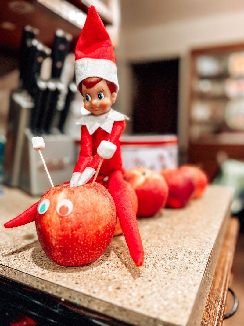 Elf on the shelf ideas elf riding apples caterpillar