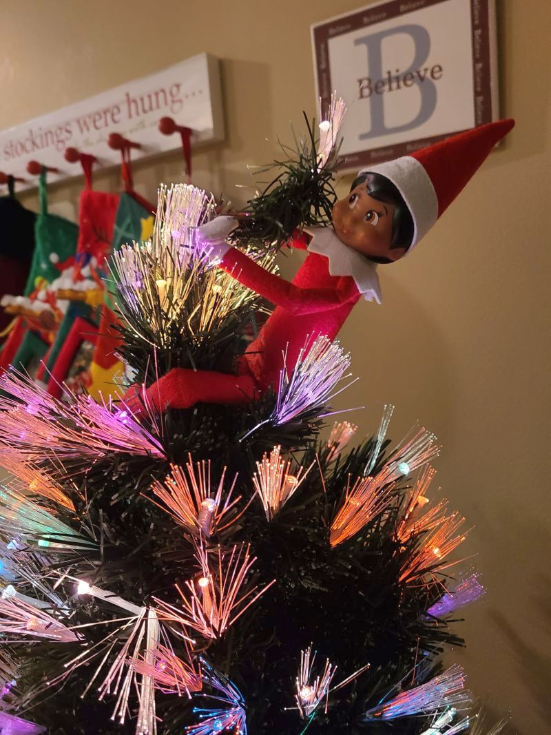 elf on the shelf ideas elf in christmas tree