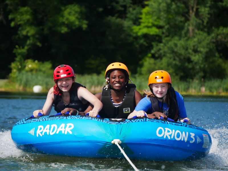 Pine Ridge Bible Camp - 2025 GR Summer Camp - Kids on tube