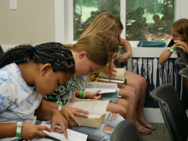 Pine Ridge Bible Camp - 2025 GR Summer Camp - Kids reading bibles